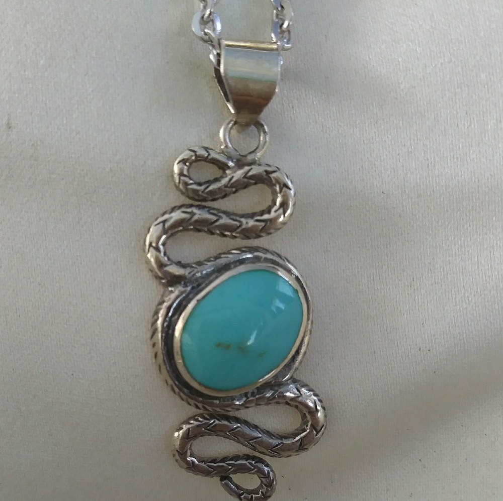 Snake shape pendant with turquoise stone